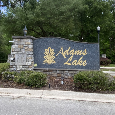 adams lake entrance sign