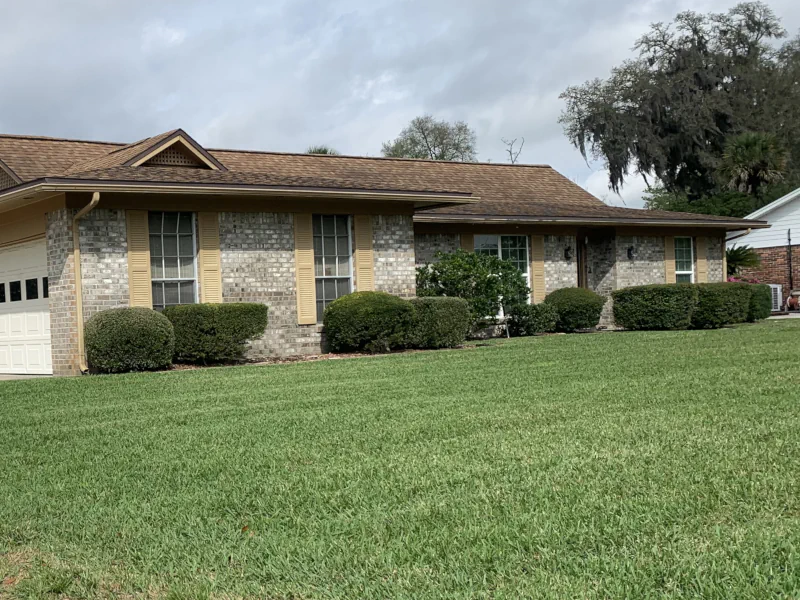 nicely mowed lawn and trimmed hedges in Orange Park Country Club.