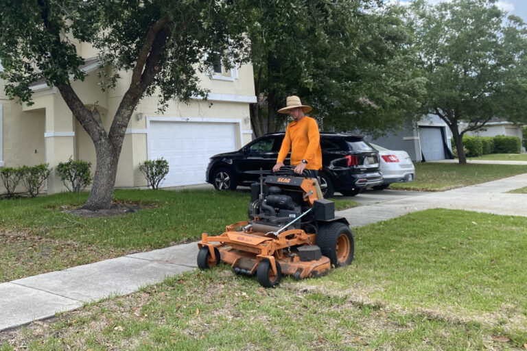 mowing recently installed sod