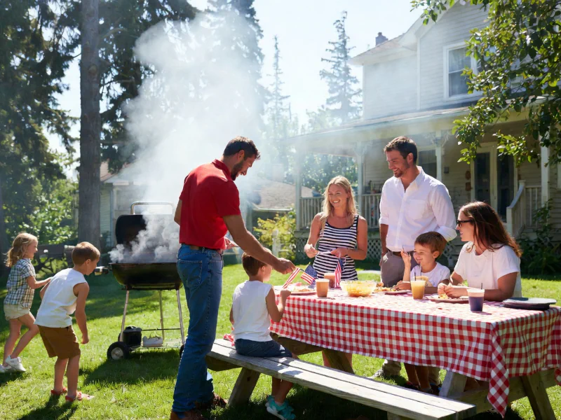 A family having a cook out on the lawn
